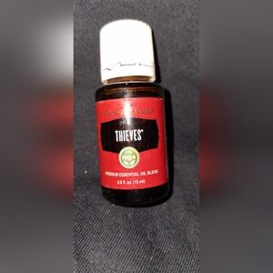 Young Living Thieves Oil with Red and Black Label